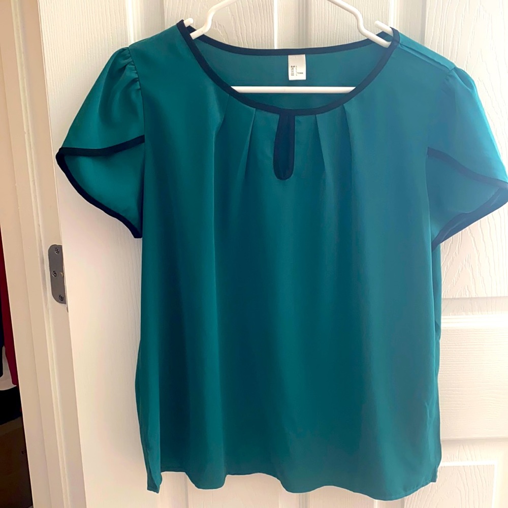 Green peephole blouse